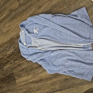 Zip up hoodie size large in blue with white lettering